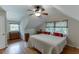 A bright bedroom with hardwood floors and a large window at 3219 Parkridge Crescent, Chamblee, GA 30341