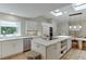 Bright eat-in kitchen featuring an island, stainless steel appliances and plenty of natural light from skylights at 3219 Parkridge Crescent, Chamblee, GA 30341