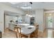 Bright eat-in kitchen featuring an island, stainless steel appliances and access to deck at 3219 Parkridge Crescent, Chamblee, GA 30341