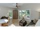 Cozy living area featuring access to backyard and eat-in dining area at 3219 Parkridge Crescent, Chamblee, GA 30341
