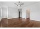 Bright, spacious bedroom featuring hardwood floors, white walls, neutral paint, and abundant natural light at 775 Hadley Ne Ln, Marietta, GA 30068