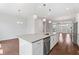 Bright kitchen area with stainless steel appliances and island at 775 Hadley Ne Ln, Marietta, GA 30068