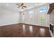 Spacious living room featuring hardwood floors, fireplace and lots of natural light at 775 Hadley Ne Ln, Marietta, GA 30068