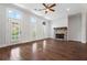 Spacious living room featuring hardwood floors, fireplace and lots of natural light at 775 Hadley Ne Ln, Marietta, GA 30068
