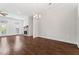 Spacious living room featuring a fireplace, hardwood floors and abundant natural light at 775 Hadley Ne Ln, Marietta, GA 30068