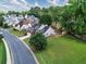 Aerial view of a traditionally styled home with a well-manicured lawn and a newly stained fence at 200 Ennisbrook Se Dr, Smyrna, GA 30082