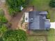 Aerial view of the home showing the backyard patio and privacy fence at 200 Ennisbrook Se Dr, Smyrna, GA 30082