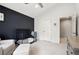 The Bedroom features a black accent wall, rocker, and closet at 200 Ennisbrook Se Dr, Smyrna, GA 30082