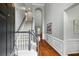 Open foyer with staircase, hardwood floors, and elegant trim work at 200 Ennisbrook Se Dr, Smyrna, GA 30082