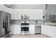 Modern kitchen with stainless steel appliances and ample counter space at 200 Ennisbrook Se Dr, Smyrna, GA 30082