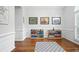 Playroom with hardwood floors, trim, and large window at 200 Ennisbrook Se Dr, Smyrna, GA 30082