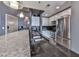 Bright kitchen featuring stainless steel appliances, granite counters, modern sink fixtures, and overhead lighting at 361 17Th St # 1121, Atlanta, GA 30363