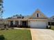 Charming, new construction, one-story home with a welcoming front porch and attached two-car garage at 341 Brooke View Trail, Canton, GA 30115