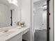 Bathroom vanity with integrated sink and decorative mirror at 5 Palace Green Place Nw, Atlanta, GA 30318