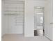 Bedroom walk-in closet with shelving at 5 Palace Green Place Nw, Atlanta, GA 30318
