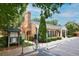 Charming brick building with EV charging stations and well-maintained landscaping at 5 Palace Green Place Nw, Atlanta, GA 30318