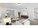 Bright living room features wood flooring and lots of space at 5 Palace Green Place Nw, Atlanta, GA 30318