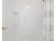 Brightly lit shower and tub combination with white tile surround at 5 Palace Green Place Nw, Atlanta, GA 30318