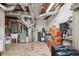 Utility basement featuring tile flooring, a washing sink, and the homes utilities at 205 Pine Lake Dr, Cumming, GA 30040