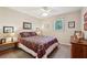 Bedroom with a window for natural light, and carpet flooring at 205 Pine Lake Dr, Cumming, GA 30040
