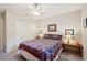 Bedroom featuring neutral walls, carpet flooring, and storage at 205 Pine Lake Dr, Cumming, GA 30040