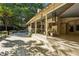 Great outdoor space featuring a large wooden deck with an attached screened in porch at 205 Pine Lake Dr, Cumming, GA 30040