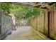 Outdoor patio featuring privacy fencing, an outdoor ceiling fan and lots of shade at 205 Pine Lake Dr, Cumming, GA 30040