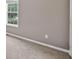 Neutral bedroom featuring a large window allowing for lots of natural light at 65 Pecan Ln, Oxford, GA 30054