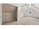 Spacious bedroom with a ceiling fan, window, and a closet at 65 Pecan Ln, Oxford, GA 30054