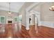 Bright and airy living room with hardwood floors, fireplace, and abundant natural light at 65 Pecan Ln, Oxford, GA 30054