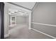 Spacious main bedroom with tray ceiling and view to ensuite bath at 65 Pecan Ln, Oxford, GA 30054