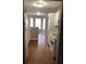Functional kitchen with white cabinets, modern appliances, and great flow into the adjacent breakfast nook at 776 Crestside Ct, Austell, GA 30168
