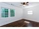 Bright bedroom with hardwood floors, featuring two large windows offering ample natural light and creating a serene space at 958 Forrest Blvd, Decatur, GA 30030