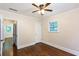 Bedroom with hardwood floors and a ceiling fan, plus a hallway view at 958 Forrest Blvd, Decatur, GA 30030