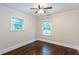 A well-lit bedroom includes hardwood floors and bright windows at 958 Forrest Blvd, Decatur, GA 30030