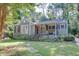 Charming single Gathering home with lovely landscaping and a cozy covered front porch at 958 Forrest Blvd, Decatur, GA 30030