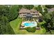 Aerial view of estate showing pool, hot tub, outdoor living area, and manicured landscaping at 170 Autry Trl, Johns Creek, GA 30022