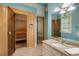 Spa-like bathroom featuring a sauna, walk-in shower, and granite countertop at 170 Autry Trl, Johns Creek, GA 30022