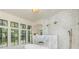 Bright bathroom featuring a soaking tub, marble wall, double shower heads, and natural light at 170 Autry Trl, Johns Creek, GA 30022