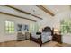 Inviting bedroom with natural light, a cozy rug, and traditional decor at 170 Autry Trl, Johns Creek, GA 30022