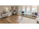 Bright bedroom features custom built-ins, a window seat and hardwood floors at 170 Autry Trl, Johns Creek, GA 30022