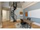 Home office featuring spiral staircase, lots of work space, and a window at 170 Autry Trl, Johns Creek, GA 30022