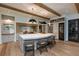 Modern kitchen with large island, stainless steel appliances, and wine cooler at 170 Autry Trl, Johns Creek, GA 30022