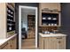 Kitchen featuring custom wood cabinets, stainless-steel appliances, and open shelving at 170 Autry Trl, Johns Creek, GA 30022