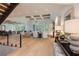 Spacious living room with hardwood floors, fireplace, and plenty of natural light at 170 Autry Trl, Johns Creek, GA 30022