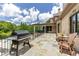 Expansive deck featuring an outdoor kitchen and grill with a beautiful backyard view at 170 Autry Trl, Johns Creek, GA 30022