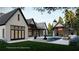 Expansive backyard with a pool and cabana, perfect for outdoor entertaining at 4585 Ryker Rd, Cumming, GA 30041