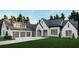 Elegant exterior with a three car garage and impeccable landscaping with new construction at 4585 Ryker Rd, Cumming, GA 30041