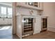 Chic wet bar equipped with wine and beverage refrigerators, ideal for entertaining in style at 4585 Ryker Rd, Cumming, GA 30041