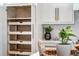 Spacious pantry with pull-out shelving maximizes storage and organization in this modern kitchen at 4585 Ryker Rd, Cumming, GA 30041